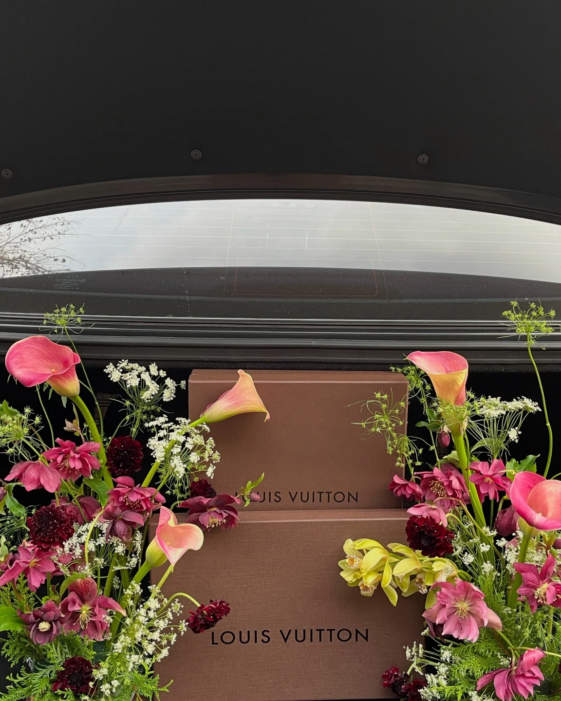 Vibrant florals styled around a brand display