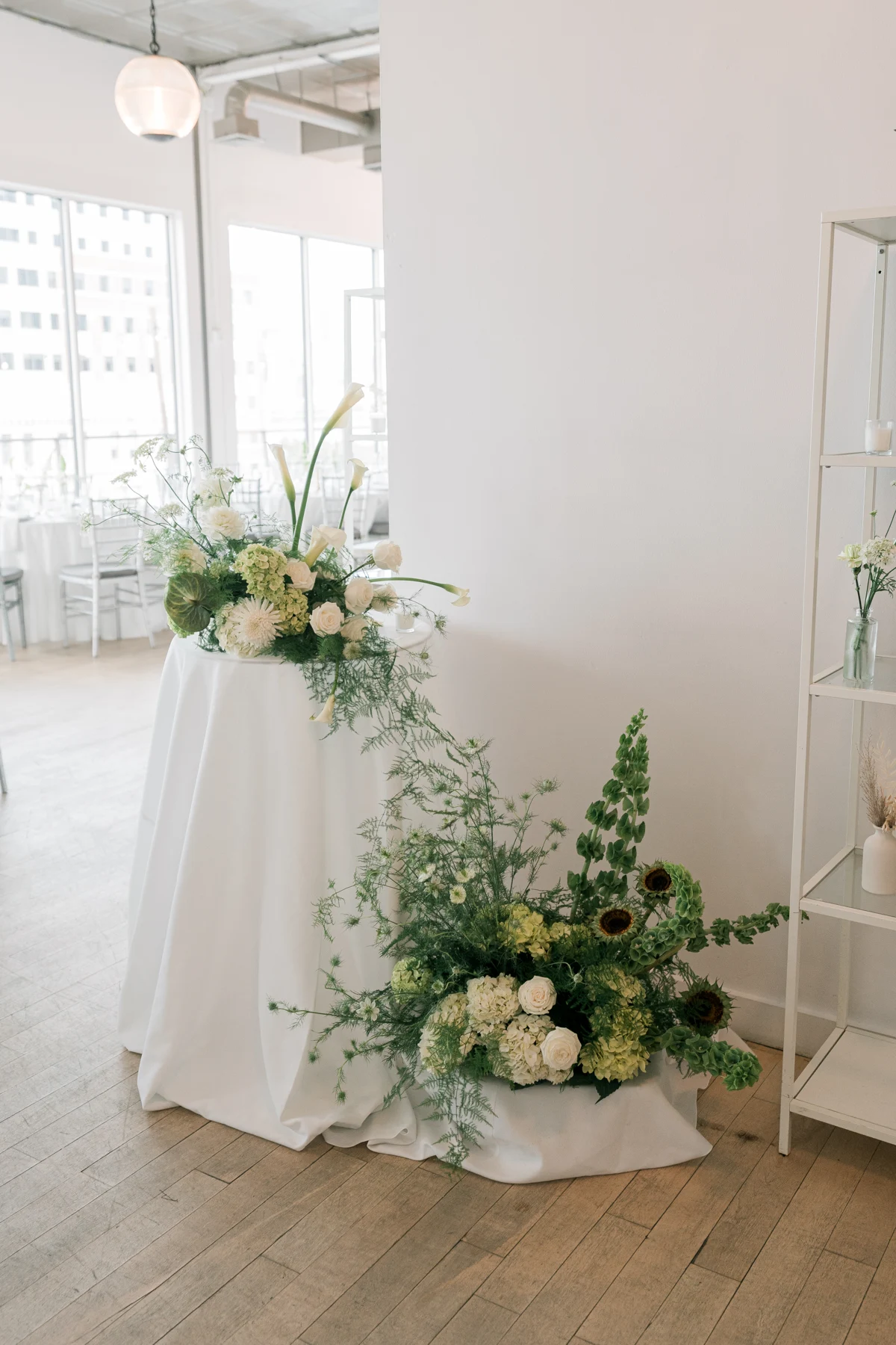 Floral installation in a light-filled event room