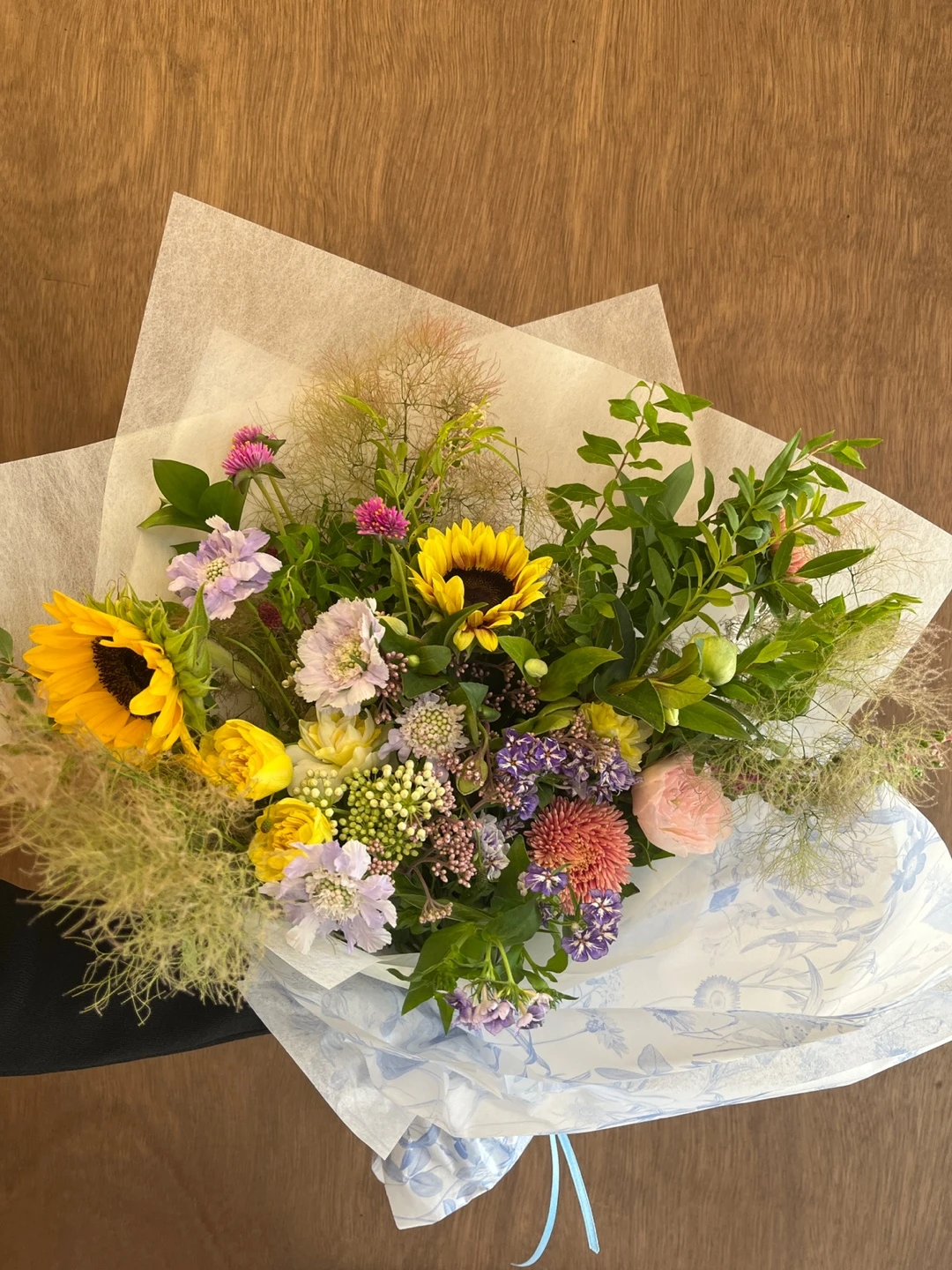 Seasonal bouquet with yellow sunflowers